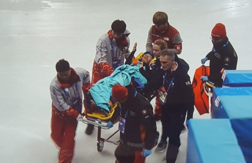 Elise Christie stretchered off Elise Christie